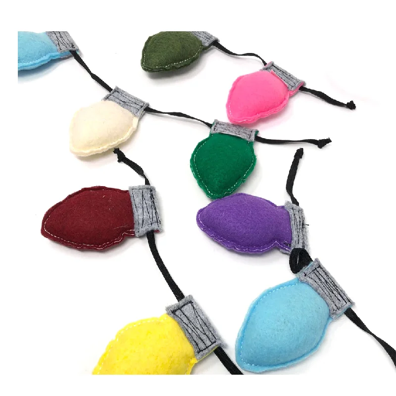 - ​​Pet toys under    yuanCatnip Christmas Lights (String of 3)